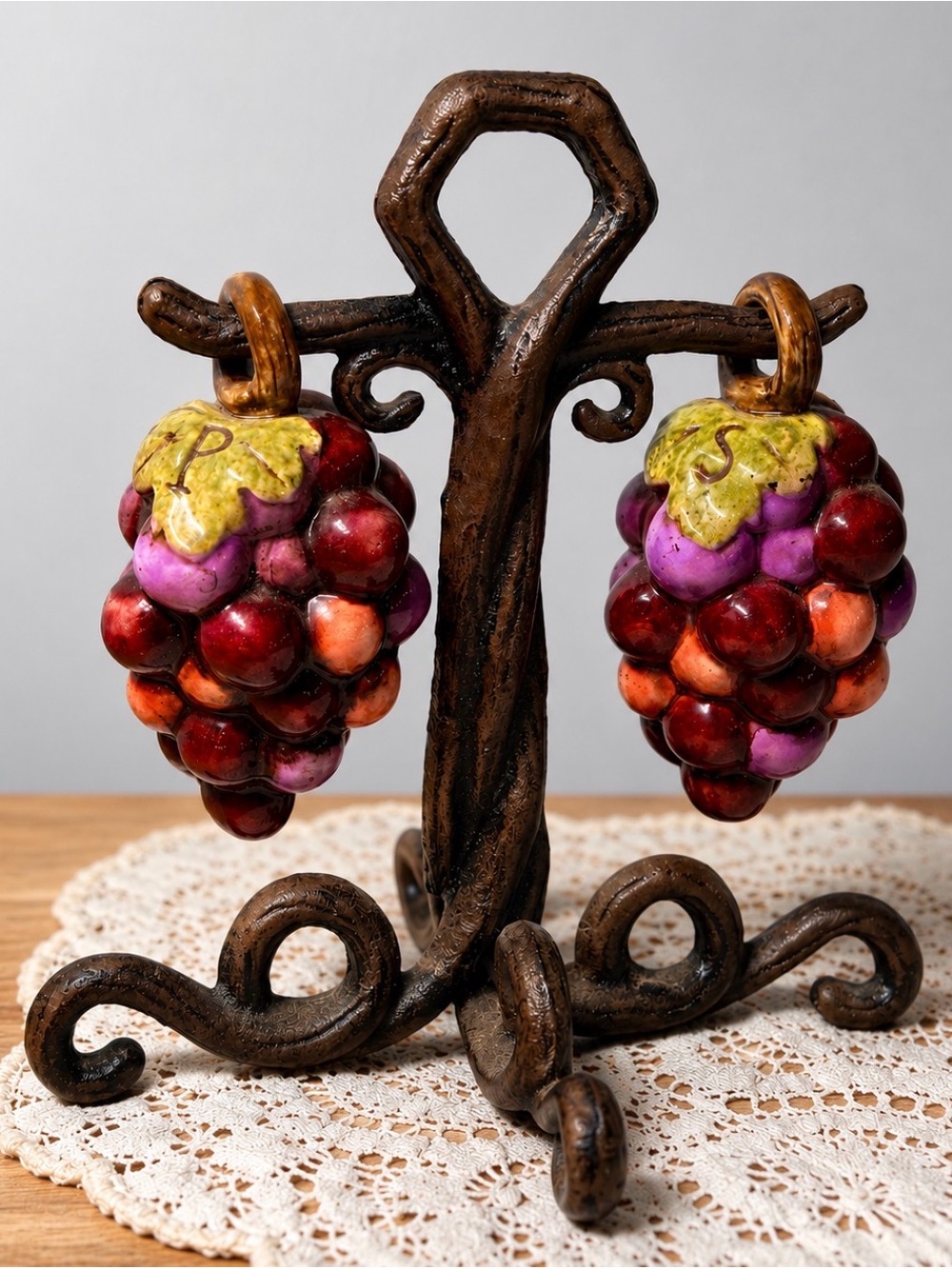Vintage Grape Cluster Salt and pepper shakers on Bronze Display .